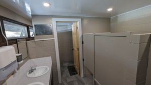 <b>Women's Washroom</b><br />Has 3 sinks, 2 toilets and 1 shower